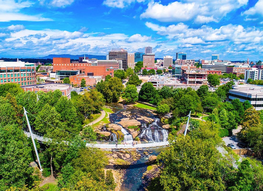 Greenville, SC - Falls Park and Liberty Bridge Panorama in Greenville, South Carolina, USA